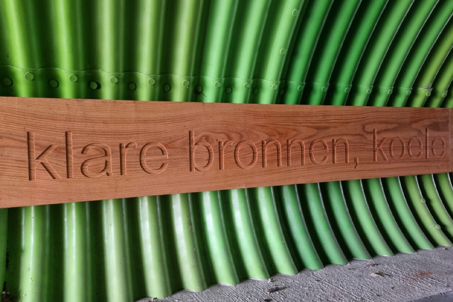 Bicycle Tunnel Enhanced with Engraved Line of Poetry on Oak Plank Bicycle Tunnel Enhanced with Engraved Line of Poetry on Oak Plank