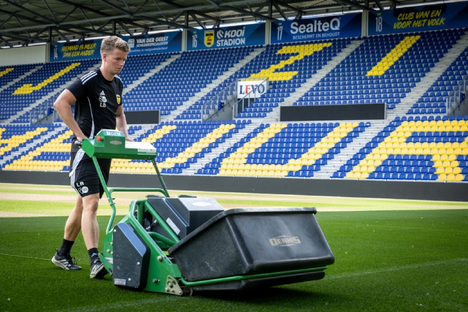 Van den Breemer operating the Dennis mower at the Kooi Stadion in Leeuwarden.